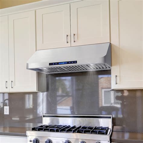 This 30 inch range hood fits easily underneath an existing cabinet, and has a premium brushed stainless steel body that matches seamlessly with existing kitchen appliances for a modern upscale look. . Cosmo kitchen hood